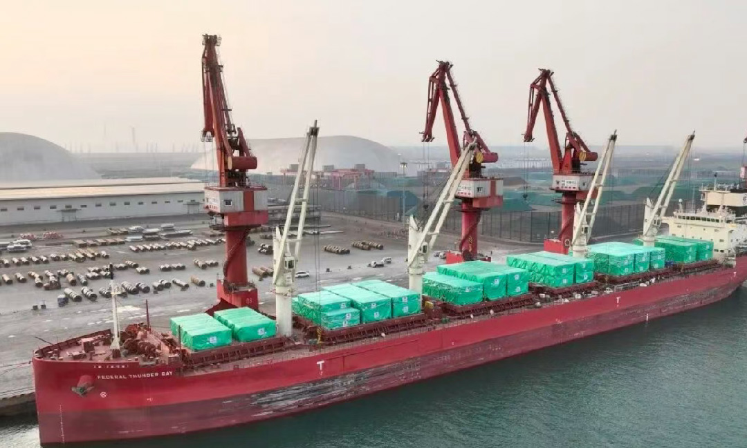 Glass wool insulation material being handled