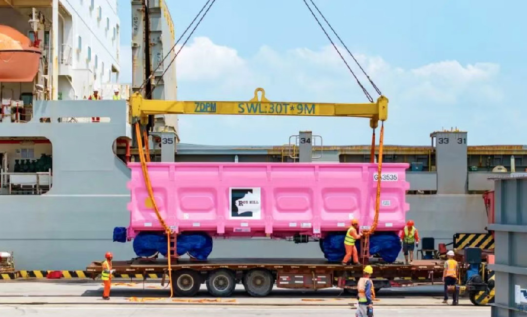 Glass wool insulation material being handled